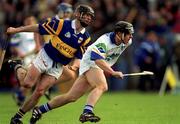 18 April 1999; Paul Flynn of Waterford in action against Donncha Fahy of Tipperary during the Church and General National Hurling League Division 1B match between Tipperary and Waterford at Semple Stadium in Thurles, Tipperary. Photo by Brendan Moran/Sportsfile