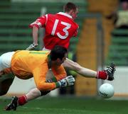 25 April 1999; Philip Clifford of Cork shoots past Meath goalkeeper Cormac Sullivan during the Church and General National Football League Semi-Final match between Cork and Meath at Croke Park in Dublin. Photo by Aoife Rice/Sportsfile