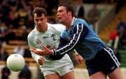 11 April 1999; Ray Cosgrove of Dublin in action against Derek Maher of Kildare during the Church and General National Football League Quarter-Final match between Dublin and Kildare at Croke Park in Dublin. Photo by Ray Lohan/Sportsfile