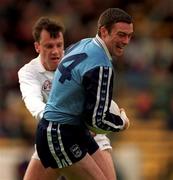 11 April 1999; Ray Cosgrove of Dublin in action against Derek Maher of Kildare during the Church and General National Football League Quarter-Final match between Dublin and Kildare at Croke Park in Dublin. Photo by Ray McManus/Sportsfile