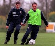 26 April 1999; Robbie Keane is tackled by Mark Kennedy during Republic of Ireland Squad training at the AUL Sports Complex in Clonshaugh, Dublin. Photo by Matt Browne/Sportsfile