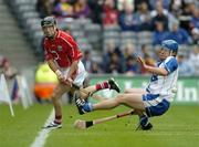 24 July 2005; Ben O'Connor, Cork, in action against James Murray, Waterford. Guinness All-Ireland Senior Hurling Championship Quarter-Final, Cork v Waterford, Croke Park, Dublin. Picture credit; Ray McManus / SPORTSFILE