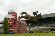 6 August 2005; Cian O'Connor, Ireland, aboard Kingsdale, in action during The Land Rover Puissance. Failte Ireland Dublin Horse Show, RDS, Ballsbridge, Dublin. Picture credit; Matt Browne / SPORTSFILE