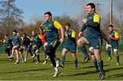 27 February 2014; Munster players including Damien Varley, right, and Dave Kilcoyne warm up during squad training ahead of their Celtic League 2013/14, Round 16, game against Scarlets on Saturday. Munster Rugby Squad Training, Cork Institute of Technology, Bishopstown, Cork. Picture credit: Diarmuid Greene / SPORTSFILE