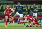 1 March 2014; Simon Zebo, Munster, evades the tackle of Gareth Davies, Scarlets. Celtic League 2013/14, Round 16, Scarlets v Munster, Parc Y Scarlets, Llanelli, Wales. Picture credit: Steve Pope / SPORTSFILE