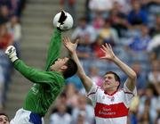 6 August 2005; Laois goalkeeper Fergal Byron contests a high ball with Enda Muldoon, Derry. Bank of Ireland All-Ireland Senior Football Championship Qualifier, Round 4, Laois v Derry, Croke Park, Dublin. Picture credit; Brendan Moran / SPORTSFILE