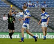 6 August 2005; Referee Paddy Russell shows a yellow card to Noel Garvan, Laois. Bank of Ireland All-Ireland Senior Football Championship Qualifier, Round 4, Laois v Derry, Croke Park, Dublin. Picture credit; Brendan Moran / SPORTSFILE