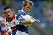 6 August 2005; Joe Higgins, Laois, in action against Eoin Bradley, Derry. Bank of Ireland All-Ireland Senior Football Championship Qualifier, Round 4, Laois v Derry, Croke Park, Dublin. Picture credit; Brendan Moran / SPORTSFILE