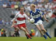 6 August 2005; Padraig Clancy, Laois, in action against Patsy Bradley, Derry. Bank of Ireland All-Ireland Senior Football Championship Qualifier, Round 4, Laois v Derry, Croke Park, Dublin. Picture credit; Brendan Moran / SPORTSFILE