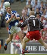 6 August 2005; Noel Garvan, Laois, hand passes the ball past the Derry goalkeeper Barry Gillis. Bank of Ireland All-Ireland Senior Football Championship Qualifier, Round 4, Laois v Derry, Croke Park, Dublin. Picture credit; Damien Eagers / SPORTSFILE