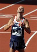 12 August 2005; Norway's Trond Nymark shows his delight after crossing the line to finish fourth in the Men's 50k Race Walk event. 2005 IAAF World Athletic Championships, Helsinki, Finland. Picture credit; Pat Murphy / SPORTSFILE
