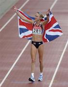 14 August 2005; Paula Radcliffe, Great Britain, celebrates after victory in the Women's Marathon. 2005 IAAF World Athletic Championships, Helsinki, Finland. Picture credit; Pat Murphy / SPORTSFILE