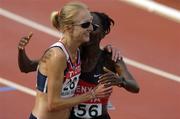 14 August 2005; Paula Radcliffe, Great Britain, is embrased by second placed Catherine Ndereba, Kenya, after victory in the Women's Marathon. 2005 IAAF World Athletic Championships, Helsinki, Finland. Picture credit; Pat Murphy / SPORTSFILE