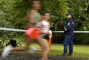 14 August 2005; A member of the Finnish Police Force watches the Women's Marathon. 2005 IAAF World Athletic Championships, Helsinki, Finland. Picture credit; Pat Murphy / SPORTSFILE