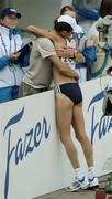 14 August 2005; Paula Radcliffe, Great Britain, is embrassed by husband Gary Lough after victory in the Women's Marathon. 2005 IAAF World Athletic Championships, Helsinki, Finland. Picture credit; Pat Murphy / SPORTSFILE