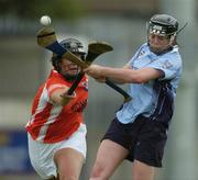 14 August 2005; Sinead Cunnane, Dublin, in action against Patrica McAvoy, Armagh. All-Ireland Junior Camogie Championship Semi-Final, Dublin v Armagh, Parnell Park, Dublin. Picture credit; David Maher / SPORTSFILE