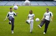 17 August 2005; Dublin midfielder Ciaran Whelan, right, and Laois goalkeeper Fergal Byron with model Roberta Rowat at the launch of the 2005 MBNA Kick Fada which will take place at Bray Emmets GAA Club, Bray, Co. Wicklow on Saturday, September 17th. Croke Park, Dublin. Picture credit; Brendan Moran / SPORTSFILE