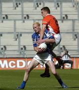 20 August 2005; Padraig Clancy, Laois, in action against Philip Loughran, Armagh, Bank of Ireland All-Ireland Senior Football Championship Quarter-Final, Armagh v Laois, Croke Park, Dublin. Picture credit; Damien Eagers / SPORTSFILE
