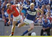 20 August 2005; Padraig Clancy, Laois, in action against Francie Bellew, Armagh. Bank of Ireland All-Ireland Senior Football Championship Quarter-Final, Armagh v Laois, Croke Park, Dublin. Picture credit; David Maher / SPORTSFILE