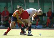 20 August 2005; Helen Richardson, England, is tackled by Nuria Camon, Spain. 7th Women's European Nations Hockey Championship, 3rd / 4th Place Play-Off Game, England v Spain, Belfield, UCD, Dublin. Picture credit; Brendan Moran / SPORTSFILE