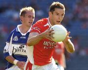 20 August 2005; Paul McGrane, Armagh, in action against Joe Higgins, Laois. Bank of Ireland All-Ireland Senior Football Championship Quarter-Final, Armagh v Laois, Croke Park, Dublin. Picture credit; David Maher / SPORTSFILE