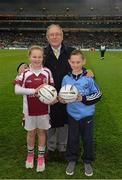 1 March 2014; Donal Bollard, from Allianz, made a special presentation in Croke Park to Grace Murray, St Finians GAA Club, Swords, and Killian Doyle, from Ballymun Kickhams GAA Club, to mark their outstanding performance during the Allianz Cumann na mBunscol competitions. Allianz Football League, Division 1, Round 3, Dublin v Cork, Croke Park, Dublin. Picture credit: Ray McManus / SPORTSFILE