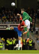 5 March 2014; Richard Keogh, Republic of Ireland, in action against Filip Dordevic, Serbia. International Friendly, Republic of Ireland v Serbia, Aviva Stadium, Lansdowne Road, Dublin. Picture credit: David Maher / SPORTSFILE