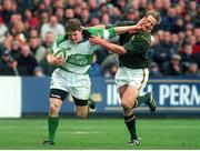 19 November 2000; Brian O'Driscoll, Ireland, in action against Robbie Fleck, South Africa. International friendly, Ireland v South Africa, Lansdowne Road, Dublin. Picture credit: Ray Lohan / SPORTSFILE