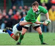 4 March 2000; Brian O'Driscoll, Ireland, is tackled by Juan Francesio, Italy. Six Nations Rugby International, Ireland v Italy, Lansdowne Road, Dublin. Picture credit: Brendan Moran / SPORTSFILE