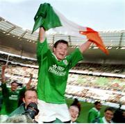 19 March 2000; Ireland's three try hero Brian O'Driscoll is held aloft by team-mates Trevor Brennan and Frank Sheahan after victory over France. Six Nations Rugby International, France v Ireland, Stade de France, Paris, France. Picture credit: Ray Lohan / SPORTSFILE