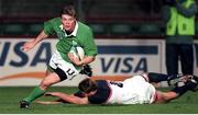 2 October 1999; Brian O'Driscoll, Ireland, goes past Dan Lyle, USA, to score Ireland's second try. 1999 Rugby World Cup, Pool E, Ireland v USA, Lansdowne Road, Dublin. Picture credit: Brendan Moran / SPORTSFILE