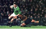 12 June 1999; Brian O'Driscoll, Ireland, is tackled by Matt Cockbain, Australia. This was his first cap for Ireland. 1999 Australia Tour, Lansdowne Cup First Test, Australia v Ireland, Ballymore Football Stadium, Brisbane, Queensland, Australia. Picture credit: Matt Browne / SPORTSFILE