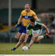 29 May 2016; Stephen Cahill of Limerick in action against Pat Burke of Clare during Munster GAA Football Senior Championship quarter-final between Limerick and Clare at Gaelic Grounds in Limerick. Photo by Sam Barnes/Sportsfile