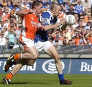 20 August 2005; Billy Sheehan, Laois, in action against Ciaran McKeever, Armagh, Bank of Ireland All-Ireland Senior Football Championship Quarter-Final, Armagh v Laois, Croke Park, Dublin. Picture credit; Damien Eagers / SPORTSFILE