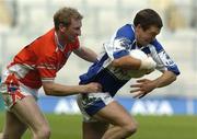 20 August 2005; Chris Conway, Laois, in action against Francie Bellew, Armagh, Bank of Ireland All-Ireland Senior Football Championship Quarter-Final, Armagh v Laois, Croke Park, Dublin. Picture credit; Damien Eagers / SPORTSFILE