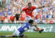 20 August 2005; Steven McDonnell, Armagh, shoots past Aidan Fennelly, Laois, to score his sides first goal. Bank of Ireland All-Ireland Senior Football Championship Quarter-Final, Armagh v Laois, Croke Park, Dublin. Picture credit; Oliver Mc Veigh / SPORTSFILE