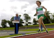 24 August 2005; Richie Yeates, 5000m/10,000m, who received a scholarship to Providence College, Rhode Island, New York, is timed by Irish Runner editor Frank Greally. Morton Stadium, Santry, Dublin. Picture credit; Brian Lawless / SPORTSFILE