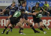 26 August 2005; Christian Warner, Leinster, is tackled by Mark Robinson, left, and Jon Clarke, Northampton. Leinster Pre-Season Friendly 2005-2006, Leinster v Northampton, Donnybrook, Dublin. Picture credit; Pat Murphy / SPORTSFILE