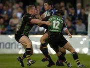 26 August 2005; Brendan Burke, Leinster, is tackled by David Quinlan, 12, and Darren Fox, Northampton. Leinster Pre-Season Friendly 2005-2006, Leinster v Northampton, Donnybrook, Dublin. Picture credit; Pat Murphy / SPORTSFILE