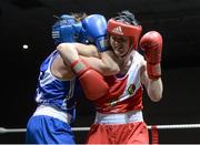 8 March 2014; Kelly Harrington, red, exchanges punches with Moira McElligot, blue, during their 64 Kg bout. National Senior Women's Boxing Championship Finals, National Stadium, Dublin. Picture credit: Matt Browne / SPORTSFILE