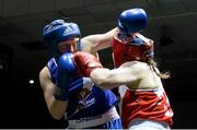 8 March 2014; Laoise Traynor, blue, exchanges punches with Claire Grace, red, during their 69 Kg bout. National Senior Women's Boxing Championship Finals, National Stadium, Dublin. Picture credit: Matt Browne / SPORTSFILE