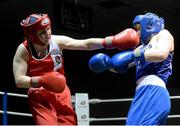8 March 2014; Claire Grace, red, exchanges punches with Laoise Traynor, blue, during their 69 Kg bout. National Senior Women's Boxing Championship Finals, National Stadium, Dublin. Picture credit: Matt Browne / SPORTSFILE