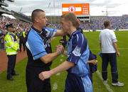27 August 2005; Dublin's Stephen O'Shaughnessy is consoled by manager Paul Caffrey at the end of the match. Bank of Ireland All-Ireland Senior Football Championship Quarter-Final Replay, Dublin v Tyrone, Croke Park, Dublin. Picture credit; Damien Eagers / SPORTSFILE