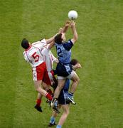 27 August 2005; Dublin's Bryan Cullen, 12, supported by team-mate Barry Cahill, in action against Davy Harte, 5, and team-mate Brian McGuigan, Tyrone. Bank of Ireland All-Ireland Senior Football Championship Quarter-Final Replay, Dublin v Tyrone, Croke Park, Dublin. Picture credit; Ray McManus / SPORTSFILE