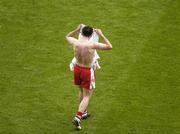 27 August 2005; Brian Dooher, Tyrone, puts on his jersey. Bank of Ireland All-Ireland Senior Football Championship Quarter-Final Replay, Dublin v Tyrone, Croke Park, Dublin. Picture credit; Ray McManus / SPORTSFILE