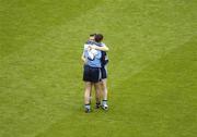 27 August 2005; Dublin's Dessie Farrell is embraced by team-mate Paddy Christie after defeat to Tyrone. Bank of Ireland All-Ireland Senior Football Championship Quarter-Final Replay, Dublin v Tyrone, Croke Park, Dublin. Picture credit; Ray McManus / SPORTSFILE