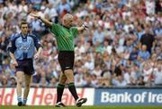 27 August 2005; Referee Gerry Kinneavy signals for a Tyrone penalty. Bank of Ireland All-Ireland Senior Football Championship Quarter-Final Replay, Dublin v Tyrone, Croke Park, Dublin. Picture credit; Damien Eagers / SPORTSFILE