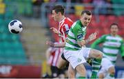 9 March 2014; Gary McCabe, Shamrock Rovers, in action against Aaron Barry, Derry City. SSE Airtricity League Premier Division, Shamrock Rovers v Derry City, Tallaght Stadium, Tallaght, Co. Dublin. Picture credit: David Maher / SPORTSFILE