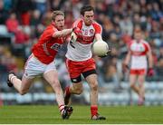 9 March 2014; Benny Heron, Derry, in action against Andrew O'Sullivan, Cork. Allianz Football League, Division 1, Round 4, Cork v Derry, Pairc Ui Rinn, Cork. Picture credit: Diarmuid Greene / SPORTSFILE