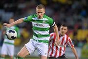 9 March 2014; Conor Kenna, Shamrock Rovers, in action against Enda Curran, Derry City. SSE Airtricity League Premier Division, Shamrock Rovers v Derry City, Tallaght Stadium, Tallaght, Co. Dublin. Picture credit: David Maher / SPORTSFILE